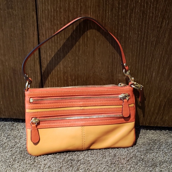 CoachTwo Tone Orange Wristlet - Picture 2 of 3